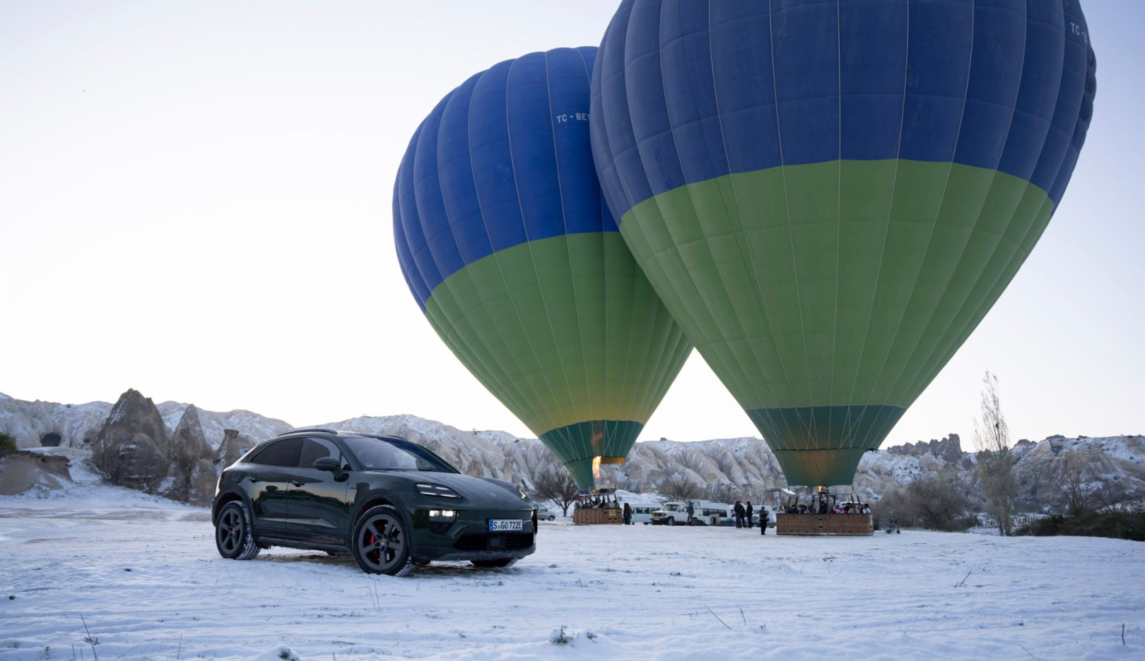 Cappadocia is famous for hot-air balloons. Usually seen far away in the sky, their size becomes particularly clear when viewed next to the Macan.