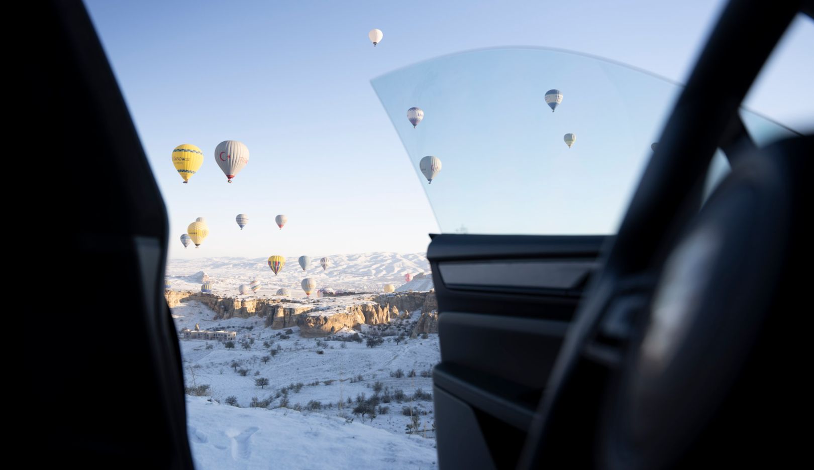 Door opener: View from the Macan of the balloonists of Cappadocia.