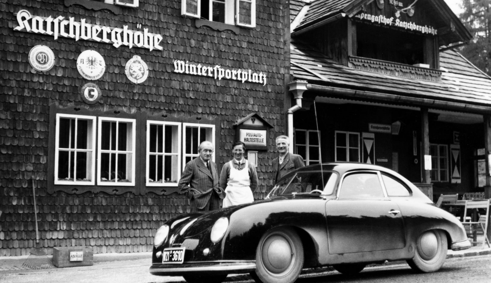 1950: Ferdinand Porsche (left) with his 356 Coupé on the Katschberg Pass in Austria.