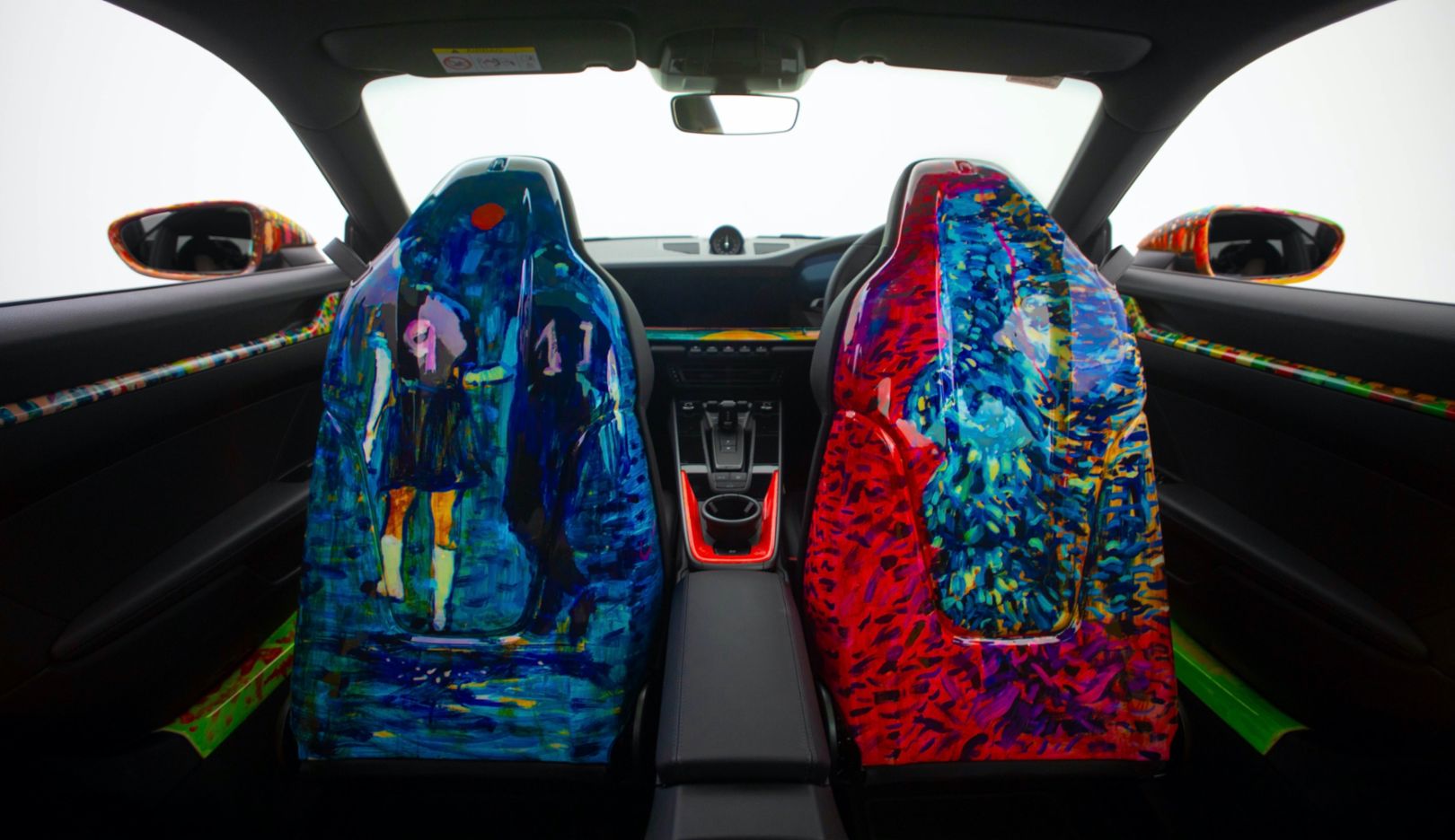 Rare viewing: The only way to see Nelson Makamo's art on the backs of the front seats is to be a passenger in his Porsche 911.