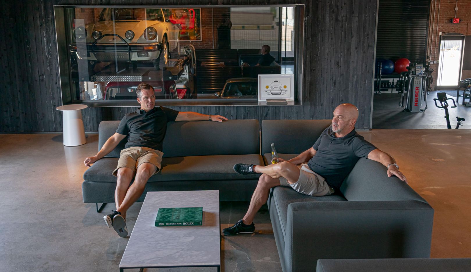 Window to happiness: Casey on a visit to Mike's Man Cave—a garage, retreat, and gym all in one. 