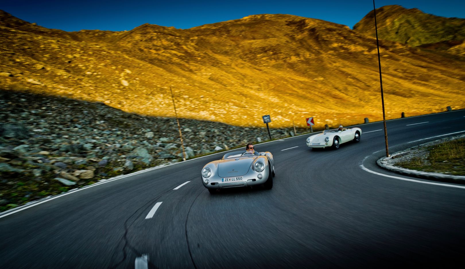 The bleak mountain world, cut through by the asphalt of the High Alpine Road, whose hairpin bends and height make equal demands on chassis and engine.