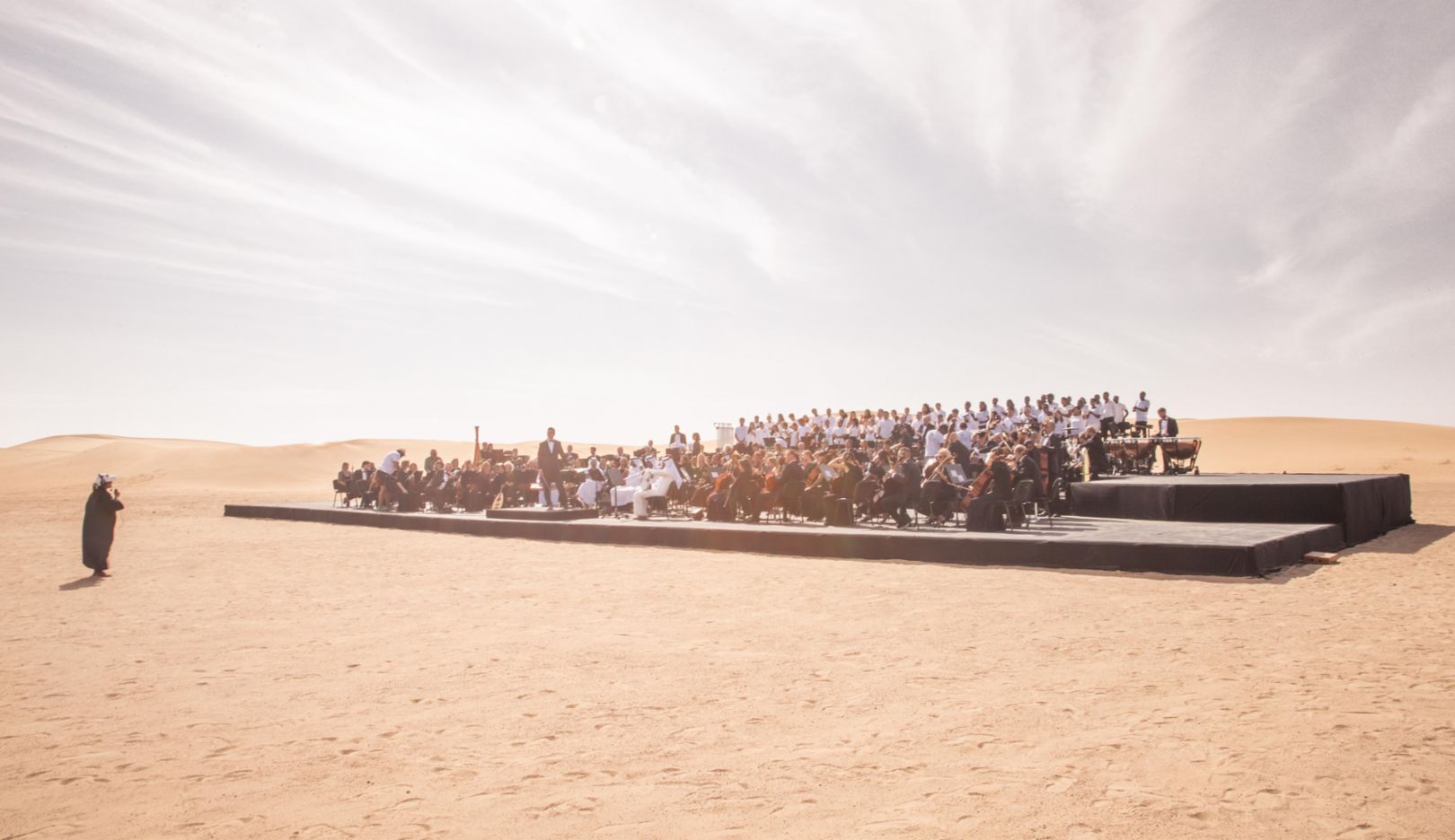 In preparation for Expo 2020, 190 musicians from around the world gathered in the desert of Dubai to play the host country's national anthem. The performance was part of festivities marking the forty-seventh National Day of the United Arab Emirates. Nayla Al Khaja directed the film. Photo: Nayla Al Khaja Films