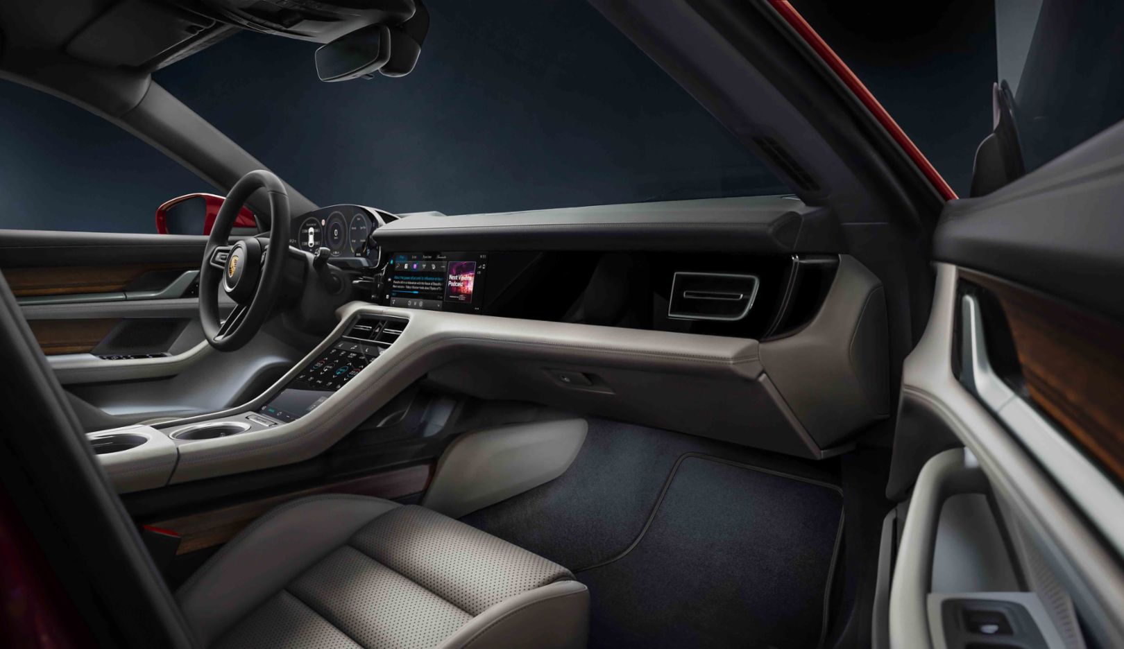 Super screen: As in the Taycan sports saloon, the front passenger in the Cross Turismo has his or her own touch display, which can be customised as desired. 
