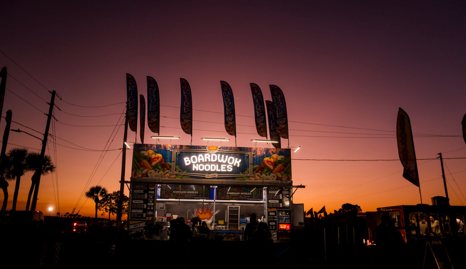 Dinner time: Away from the slopes, the sky glows above the food trucks.