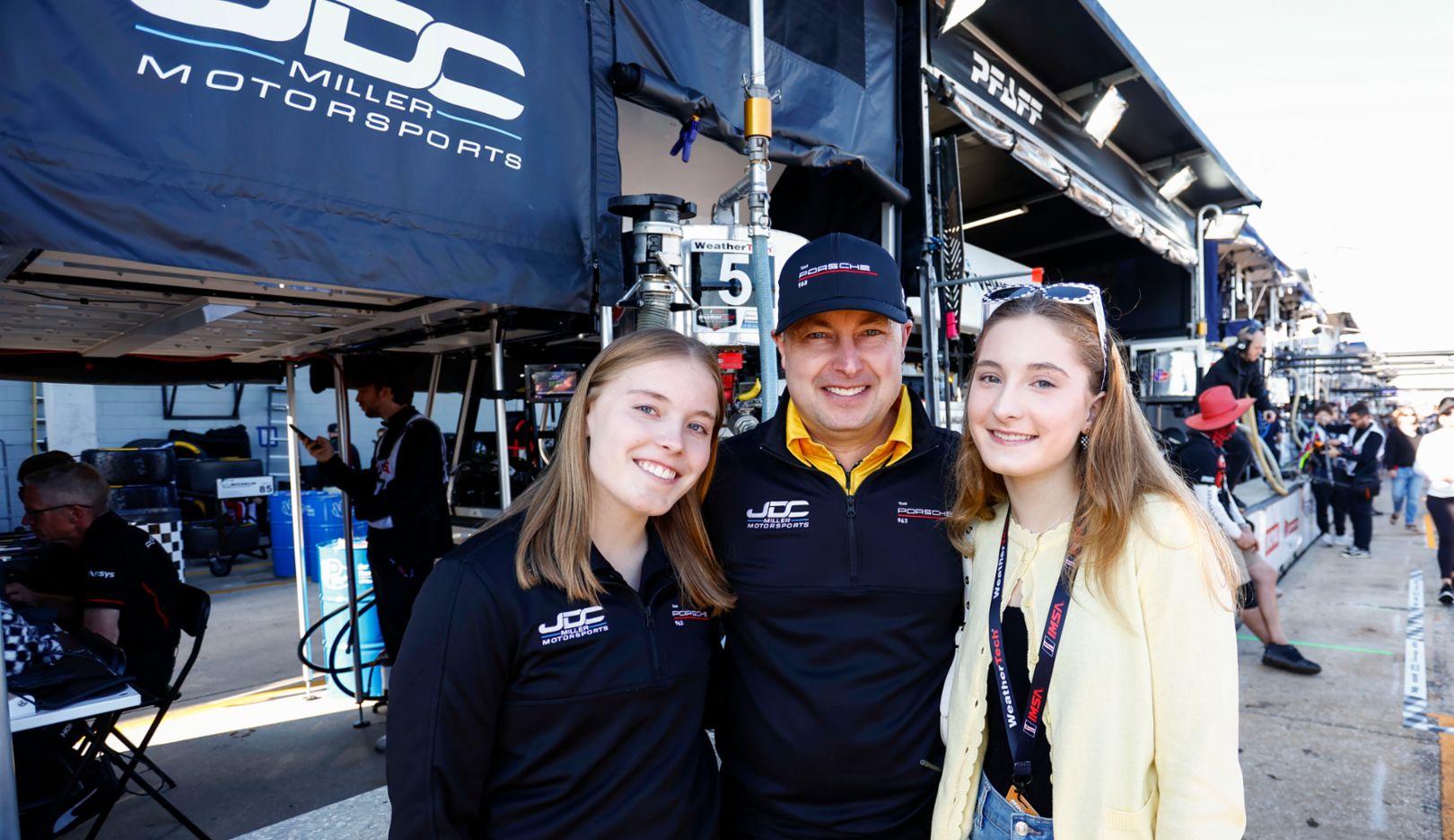 Racing in the blood: Team principal John Church with his daughters Sophie and Josie.