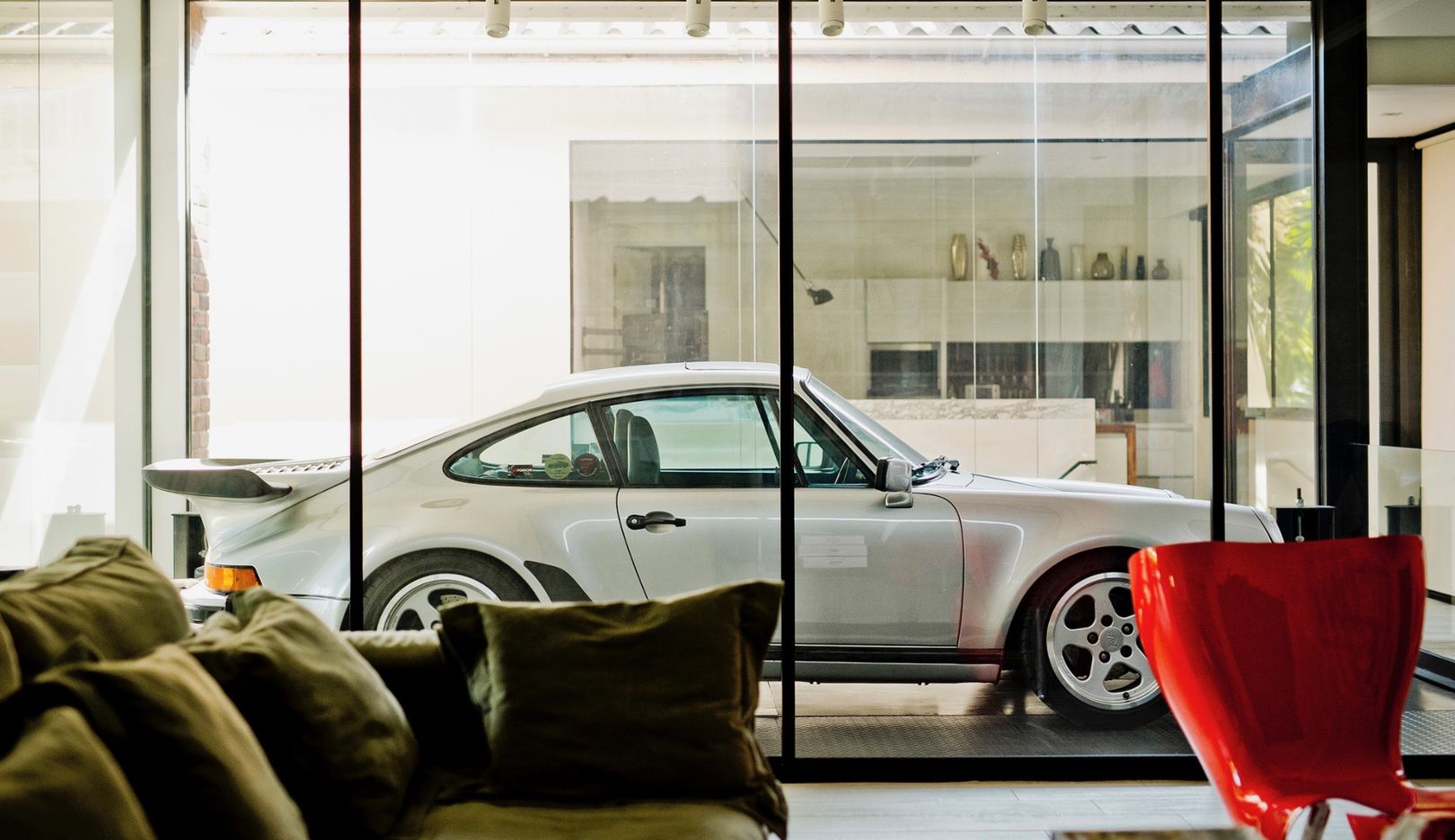 His Home: “Safe haven and childhood dream at the same time. This is how I always wanted to live. Here I can take time off to relax or spend it with my cars without even driving them.”